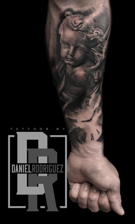 Daniel Rodriguez - Cherub clock tattoo